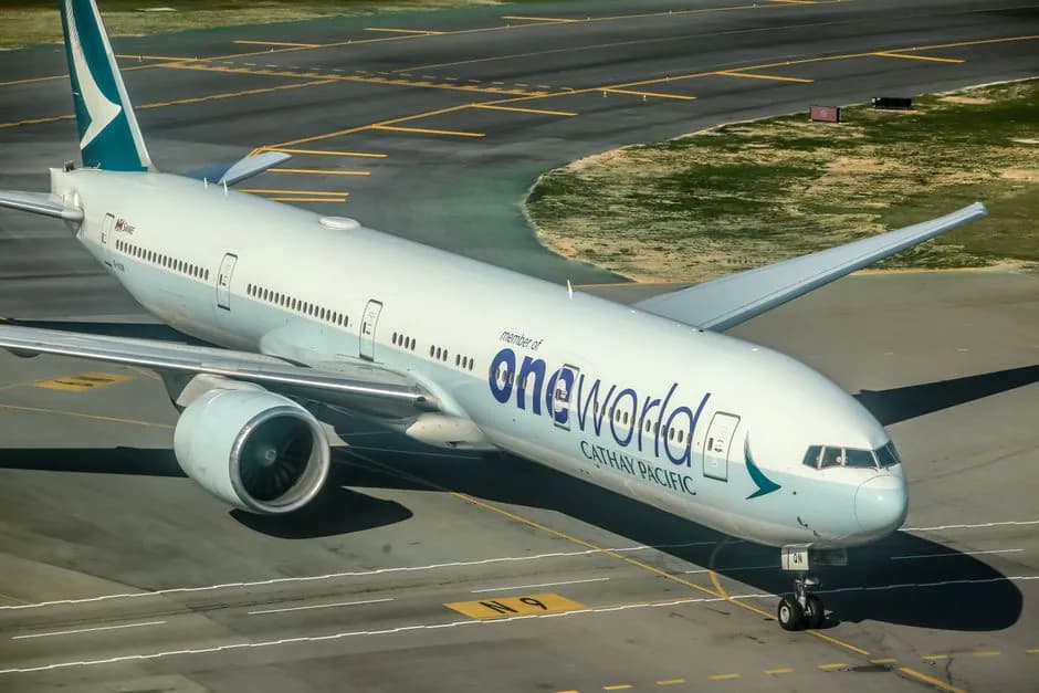 JAL Boeing 777 in Oneworld livery taxiing at airport